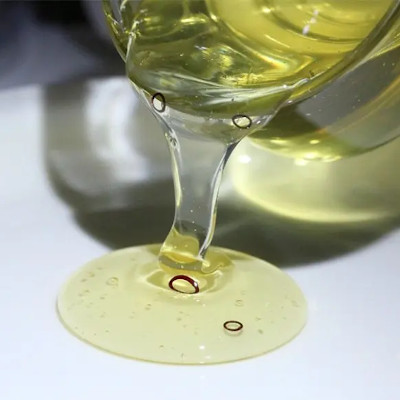 Soft robots steered by light swim in viscous fluids