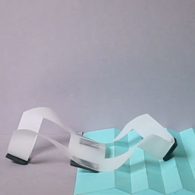 Flat sheets that fold into smart robots