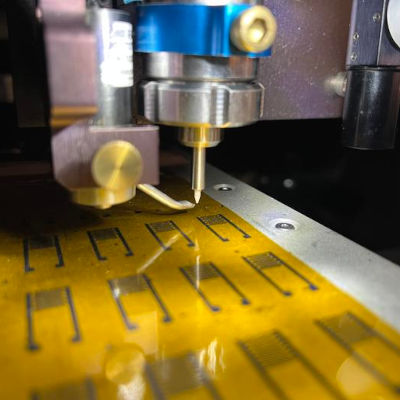 Printed artificial neurons communicate with living brain cells